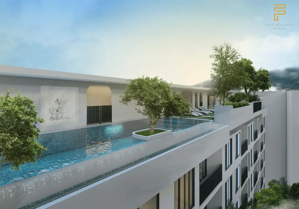 Бассейн на крыше корпуса с видом на холмы Камалы в Fantasea Condo Kamala, Пхукет