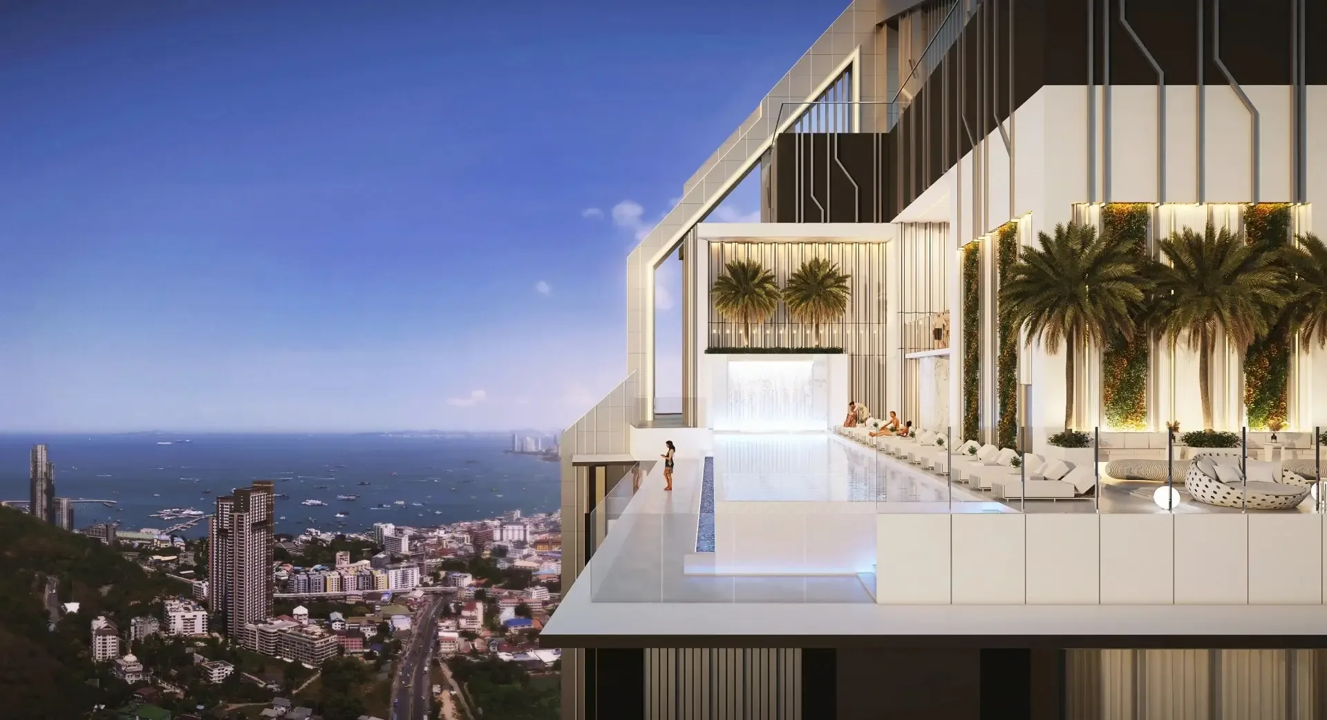 Бассейн на высоком этаже ЖК Grand Solaire с панорамным видом на море и Паттайю