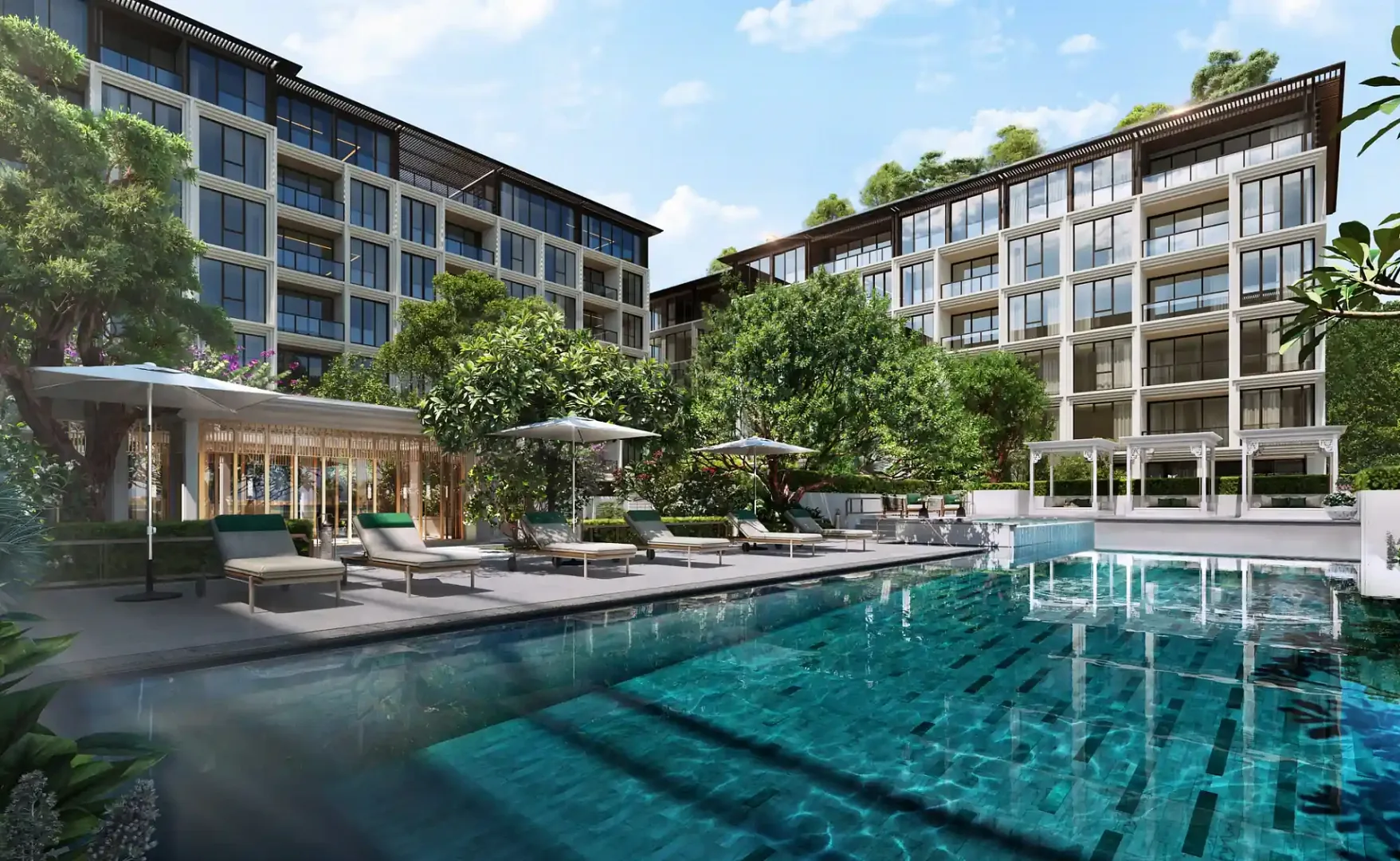 Открытый бассейн с шезлонгами между двумя корпусами InterContinental Kamala, Камала, Пхукет