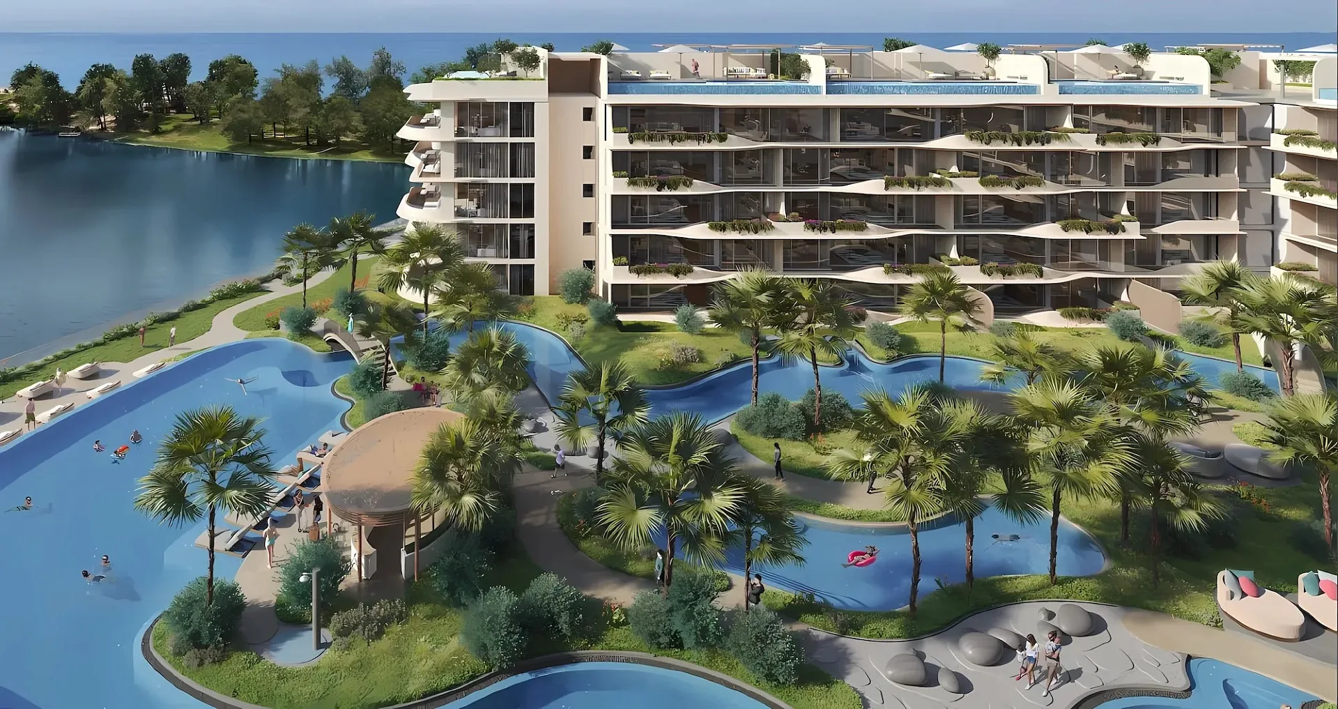 Пятиэтажный корпус и бассейны-лагуны с пальмами во дворе Laguna Beach Residences Bayside, Банг-Тао, Пхукет