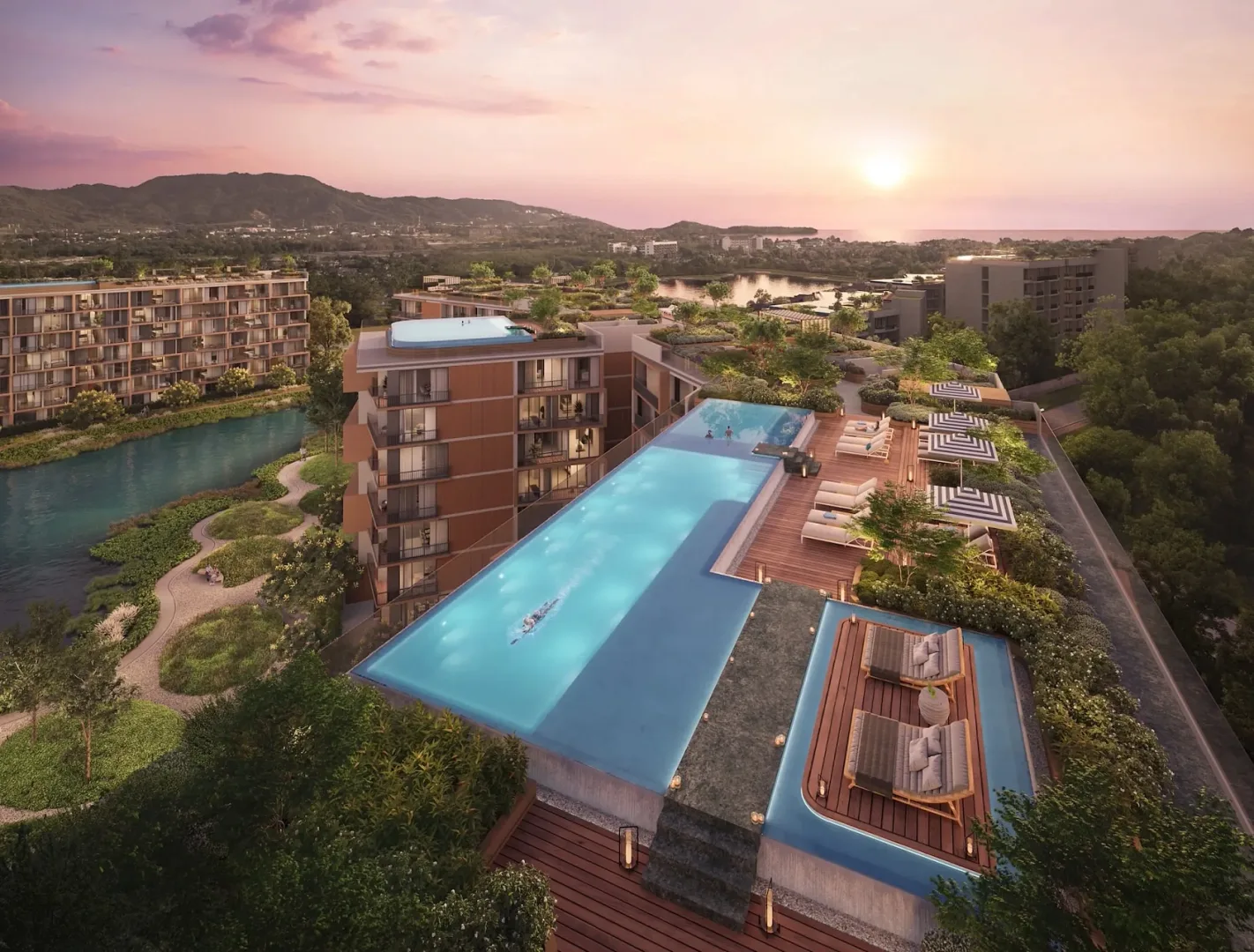 Инфинити-бассейн на крыше жилого корпуса Skypark Elara на закате, Банг-Тао, Пхукет